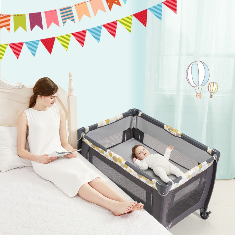 4-in-1 Convertible Portable Baby Playard Newborn Napper with Music and Toys-BlueCostway Gallery View 1 of 13