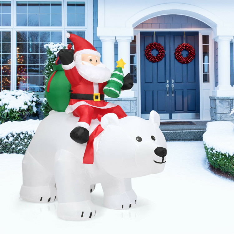 6.5 Feet Christmas Inflatable Santa Riding Polar Bear with Shaking Head LED LightsCostway Gallery View 1 of 9