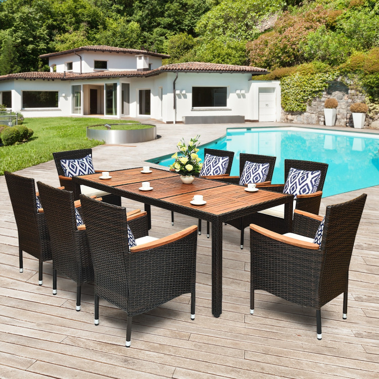 9 Pieces Patio Rattan Dining Set with Stackable Chairs Cushioned and Acacia Wood Table TopCostway Gallery View 6 of 11