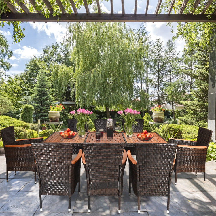 9 Pieces Patio Rattan Dining Set with Stackable Chairs Cushioned and Acacia Wood Table TopCostway Gallery View 7 of 11