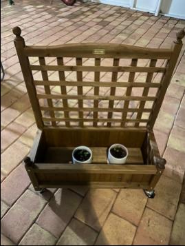 Nice Planter Box with Trellis and has Wheels for easy moving