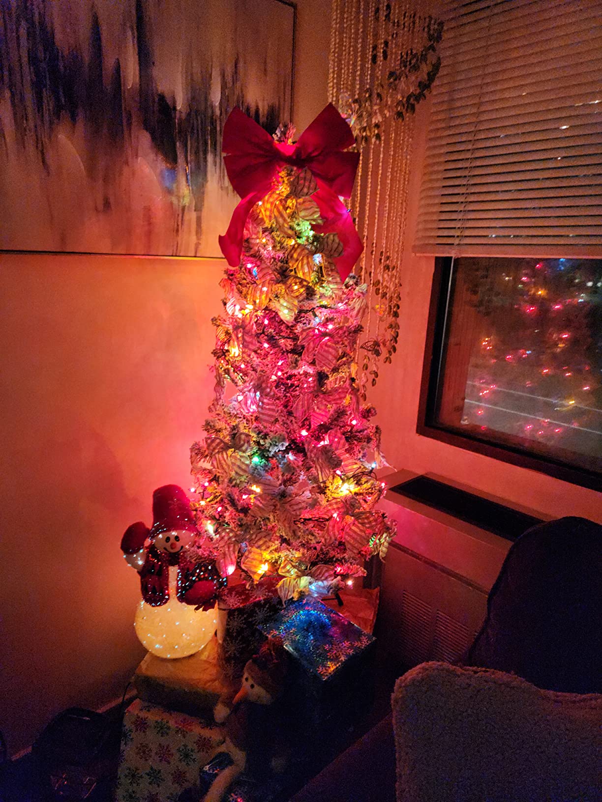 I get a more gorgeous glow with my flocked Christmas tree.